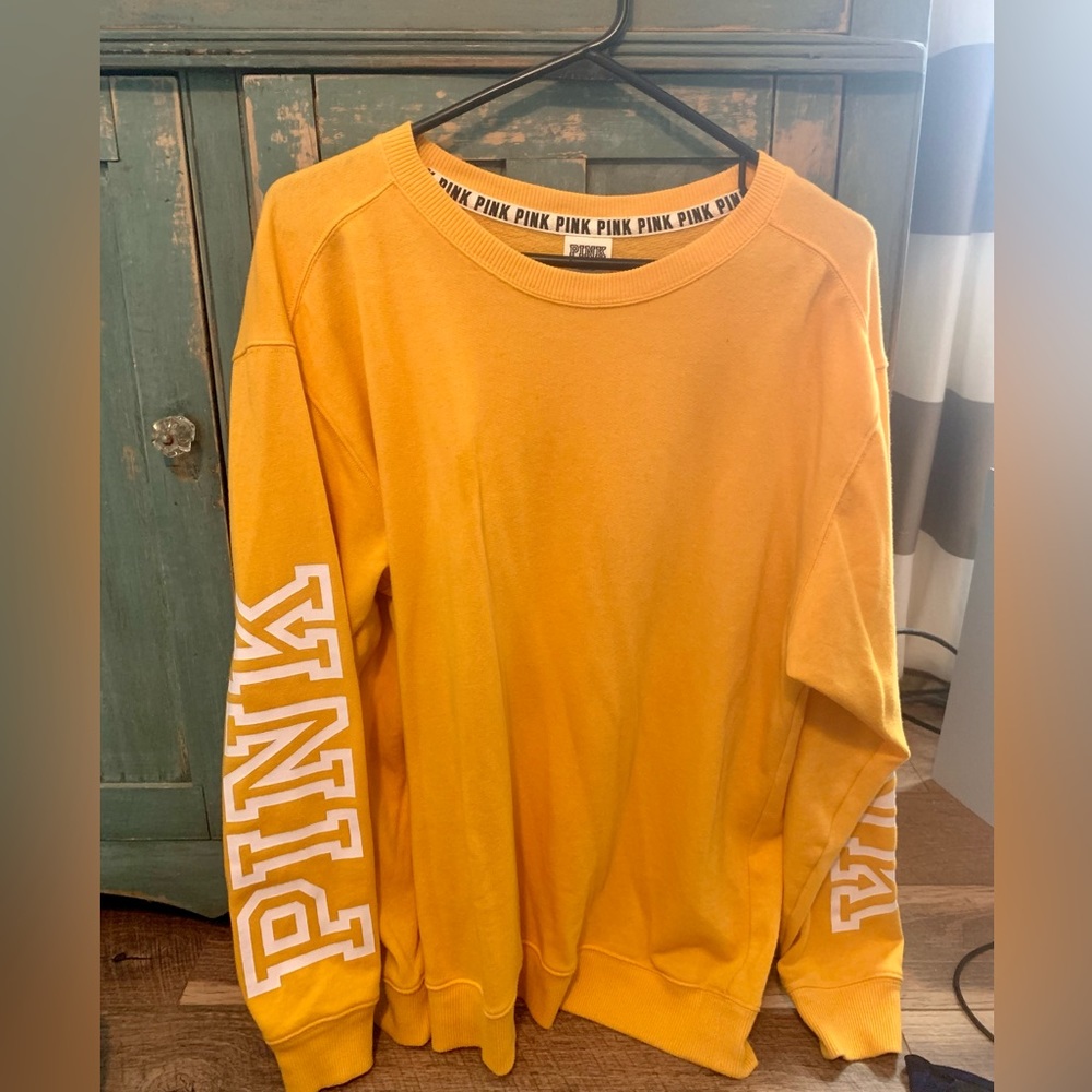 Pink size medium sweatshirt.